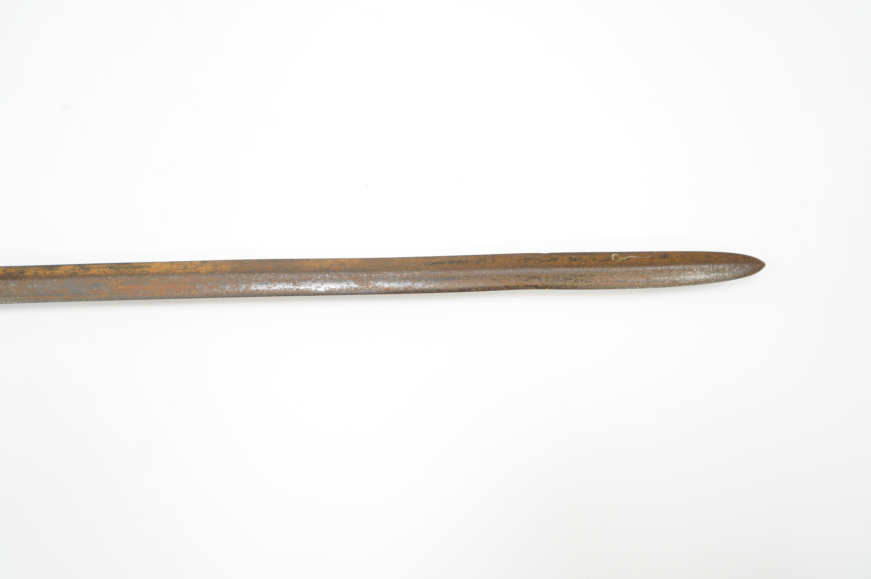 An African spear, with elongated iron tip and short hardwood shaft, 185cm. Condition fair to good, with patination.